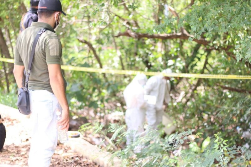 Hallan dos cuerpos embolsados en carretera a Punta Sam